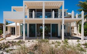 Aqua Del Rose 2 Bedroom Beachfront Cottage Long Bay Exterior photo